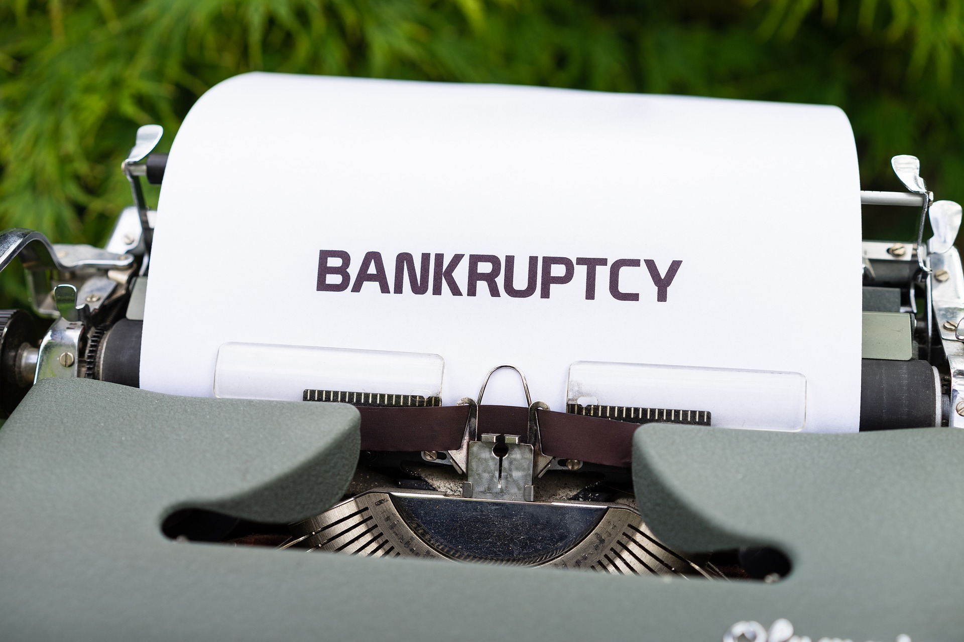 bankruptcy typed on typewriter paper